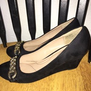 Black closed-toe wedges